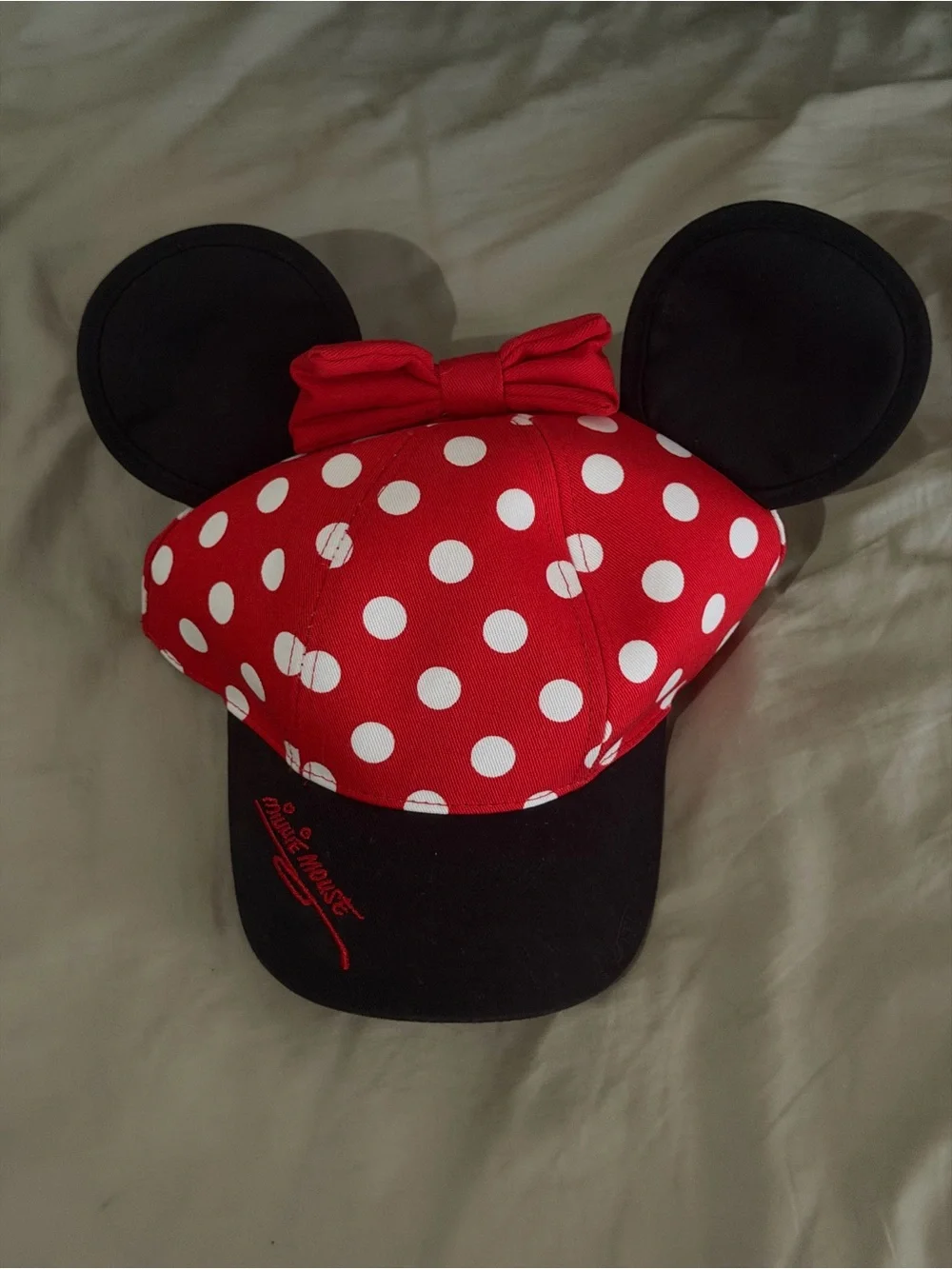 Disney unisex Red Polka Dot Minnie Mouse Ear Hat with Black Ears and bow